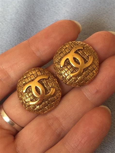 chanel symbol earrings fake|non authentic chanel earrings.